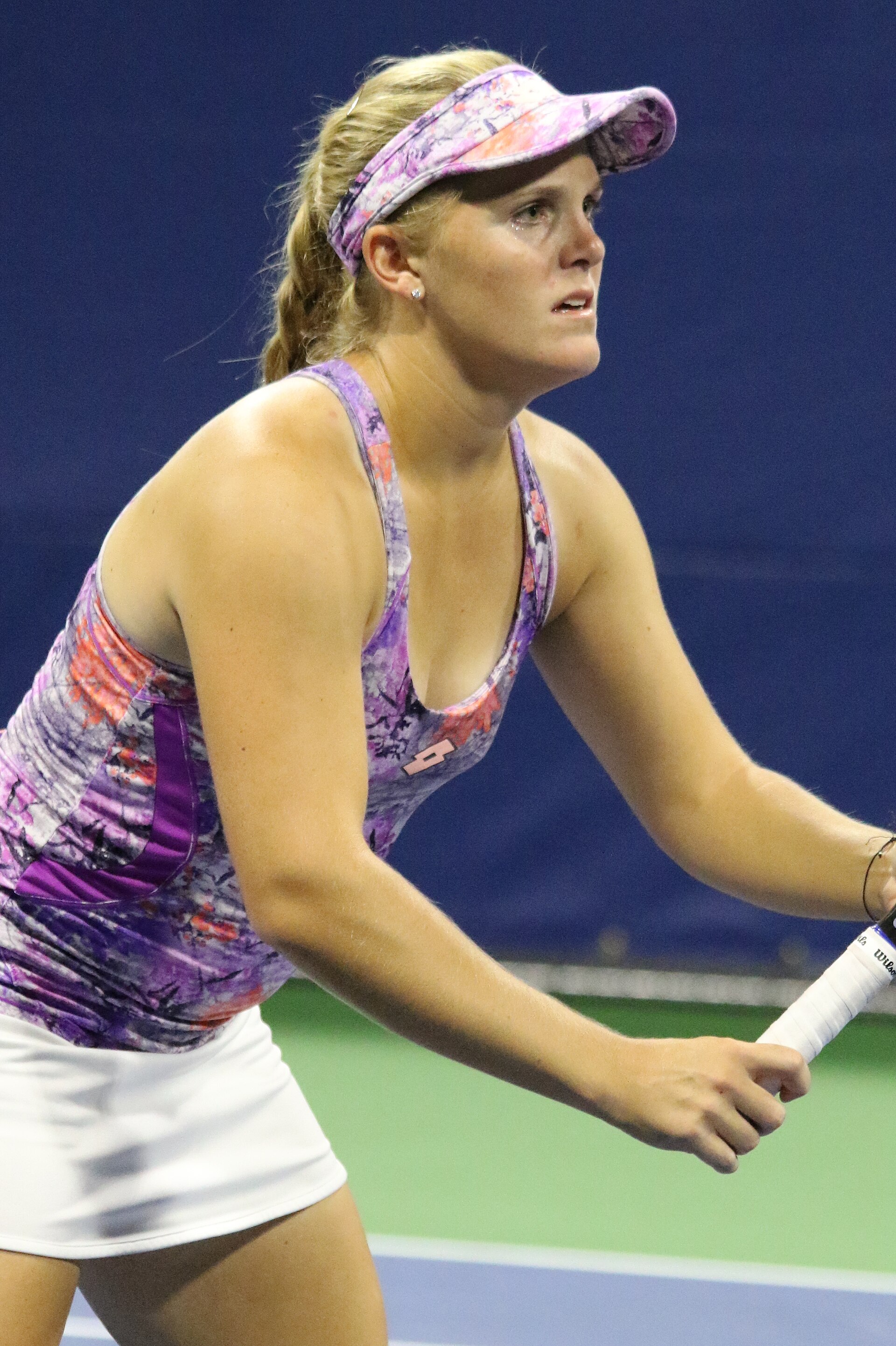 Imagem de referência relacionada a Melanie Oudin, item descrito como tenista norte-americana